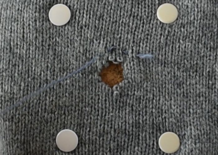 Blanket stitch mending sweater tutorial step 1 image