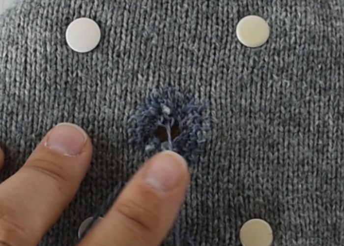 Blanket stitch mending sweater tutorial step 5 image