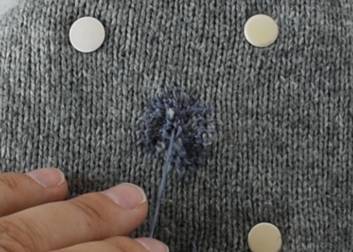 Blanket stitch mending sweater tutorial step 6 image