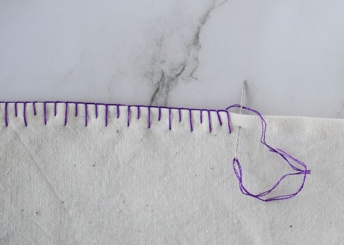 Decorating a hem with Long and Short Blanket Stitch image