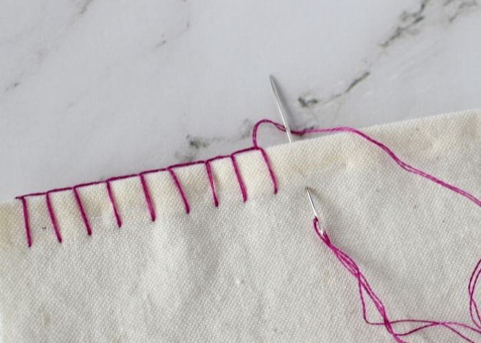 Edging the fabric with Blanket stitch image