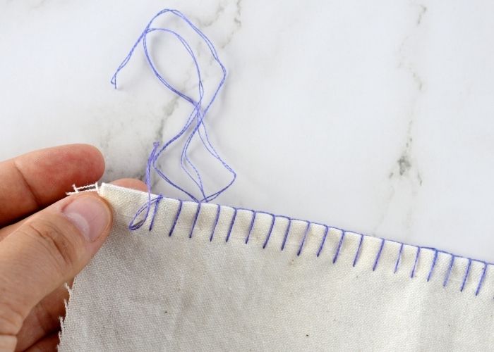 Edging the fabric with Buttonhole Stitch image