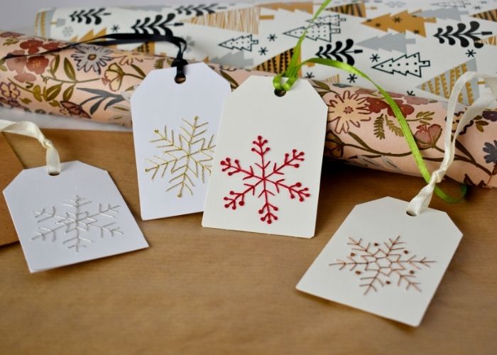 DIY Christmas gift tags with different ribbons for hanging image