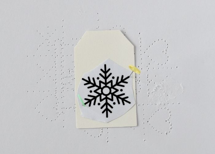 Layer the design on the tag for pattern transfer image