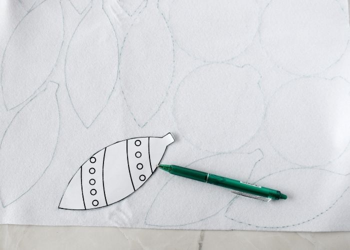 Ornament shapes traced on white felt image