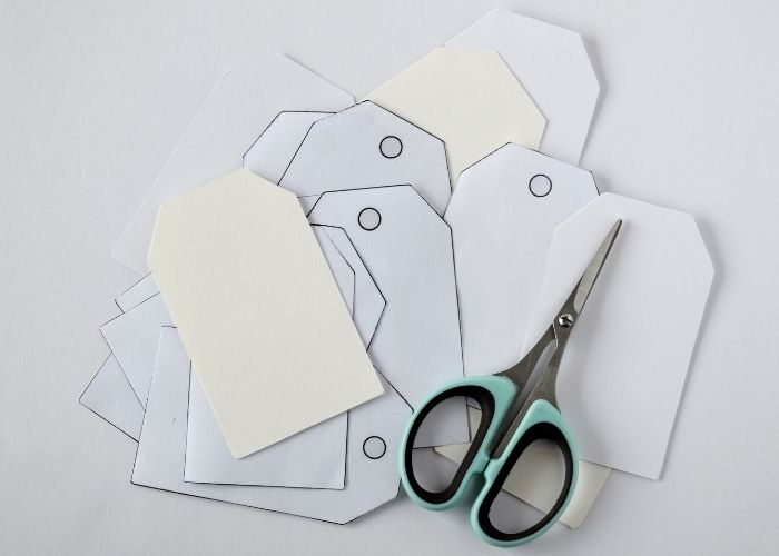 Paper tags ready for embroidery image