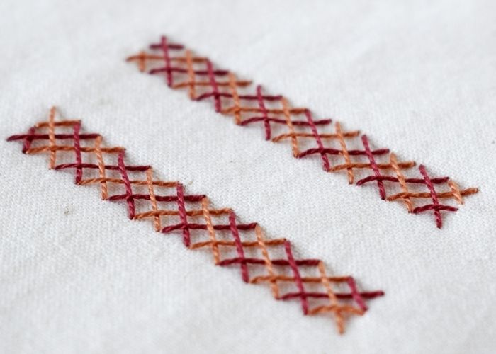 Double Herringbone Stitch sampler with brown pearl cotton thread image