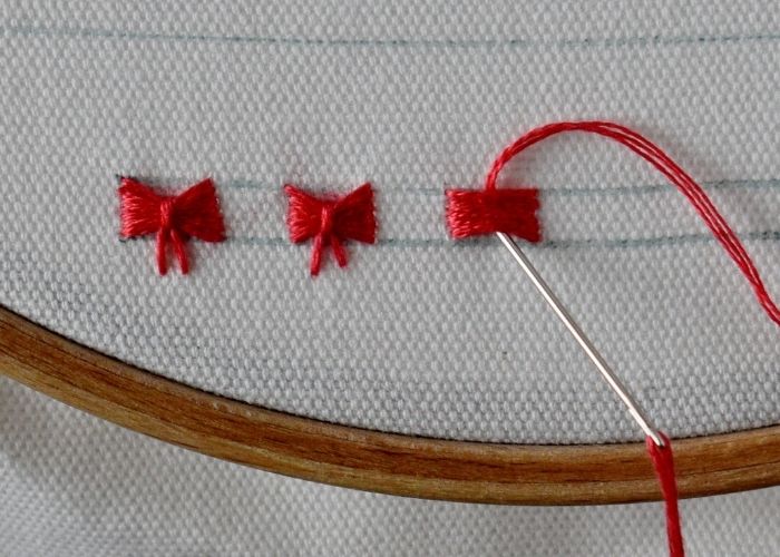 Simple border embroidery design - Bows - embroidery instructions step 8 image