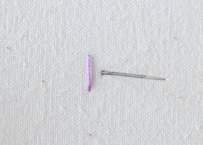 Tutorial per il ricamo del nodo a quattro gambe passo 2 immagine