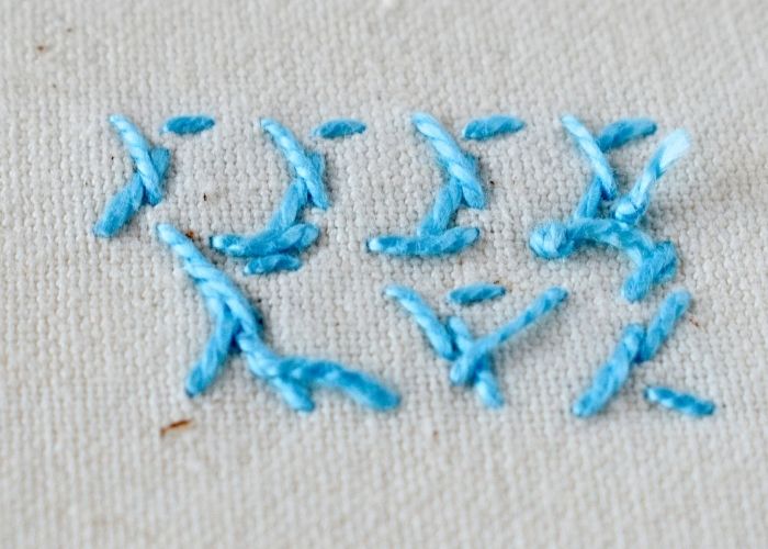 Reversed Fly Stitch embroidery sampler reverse side image