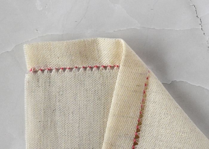 Sampler of Hem Stitch made by hand demonstrating both front and reverse sides of the fabric image