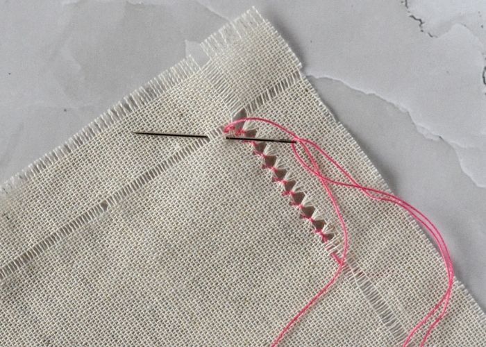 Making a corner with a hem stitch image