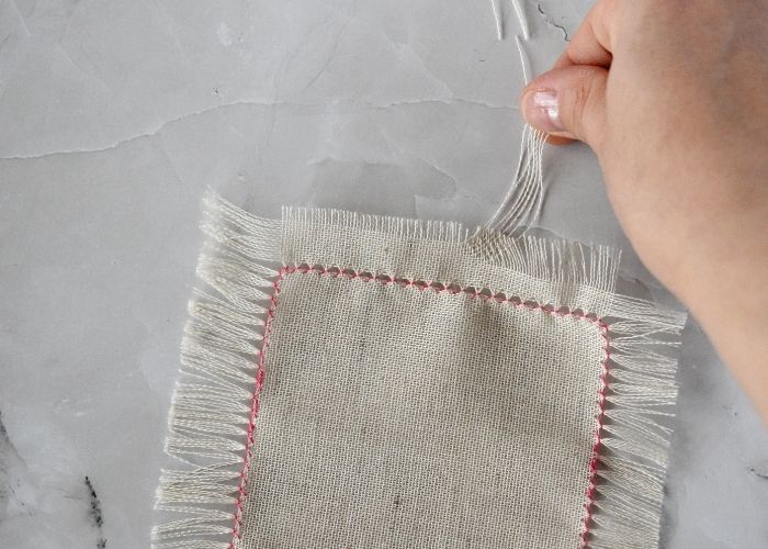 Removing threads to create a fringe image