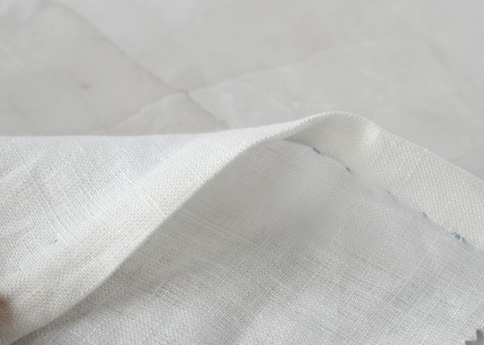 Tutorial per cucire l'orlo a mano a punto scorsoio passo 8 immagine