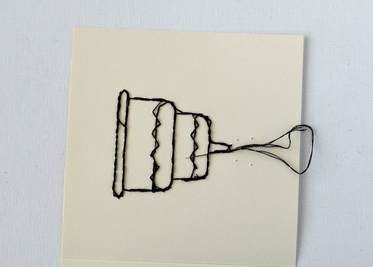 Embroidery on paper back side image
