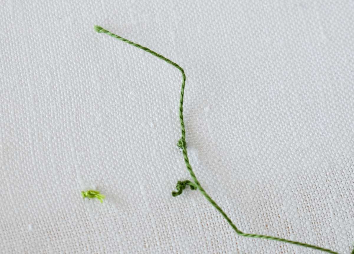 Starting French Knots with a waste knot tutorial step 6 image