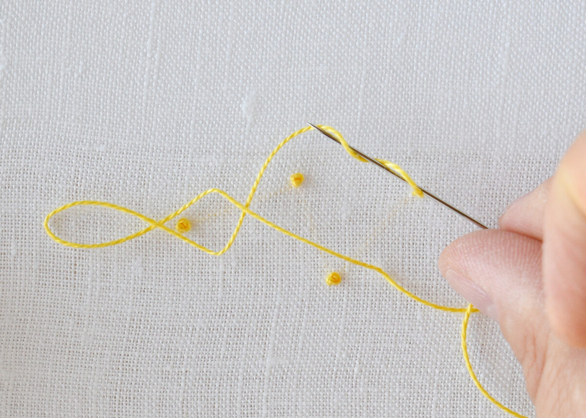 Yellow French knot step 2